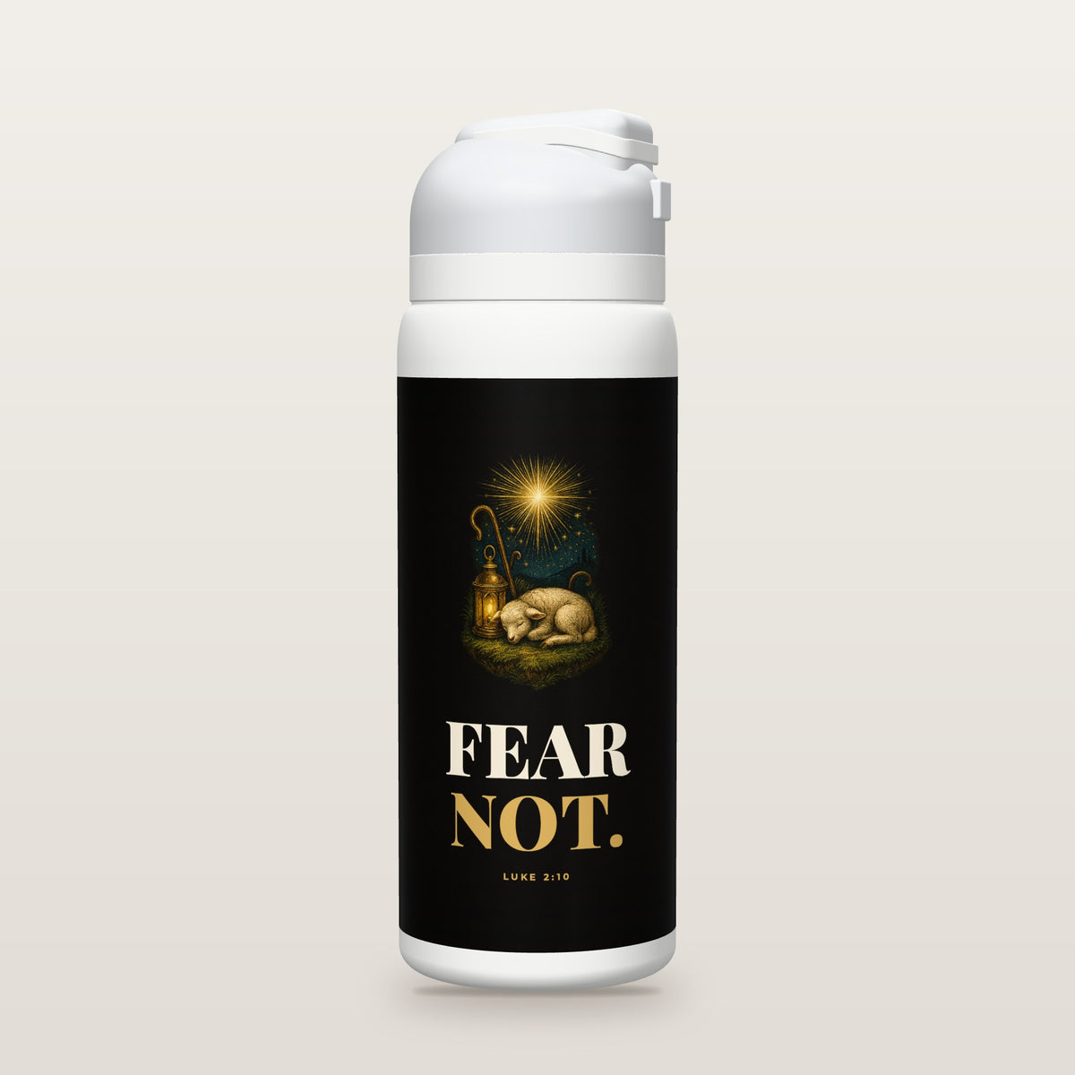 White Owala water bottle with a black printed band, a hand-painted engraving of a sleeping lamb, a shepherd's crook and a lantern under a burst of heavenly light, and the words FEAR NOT. with Luke 2:10.