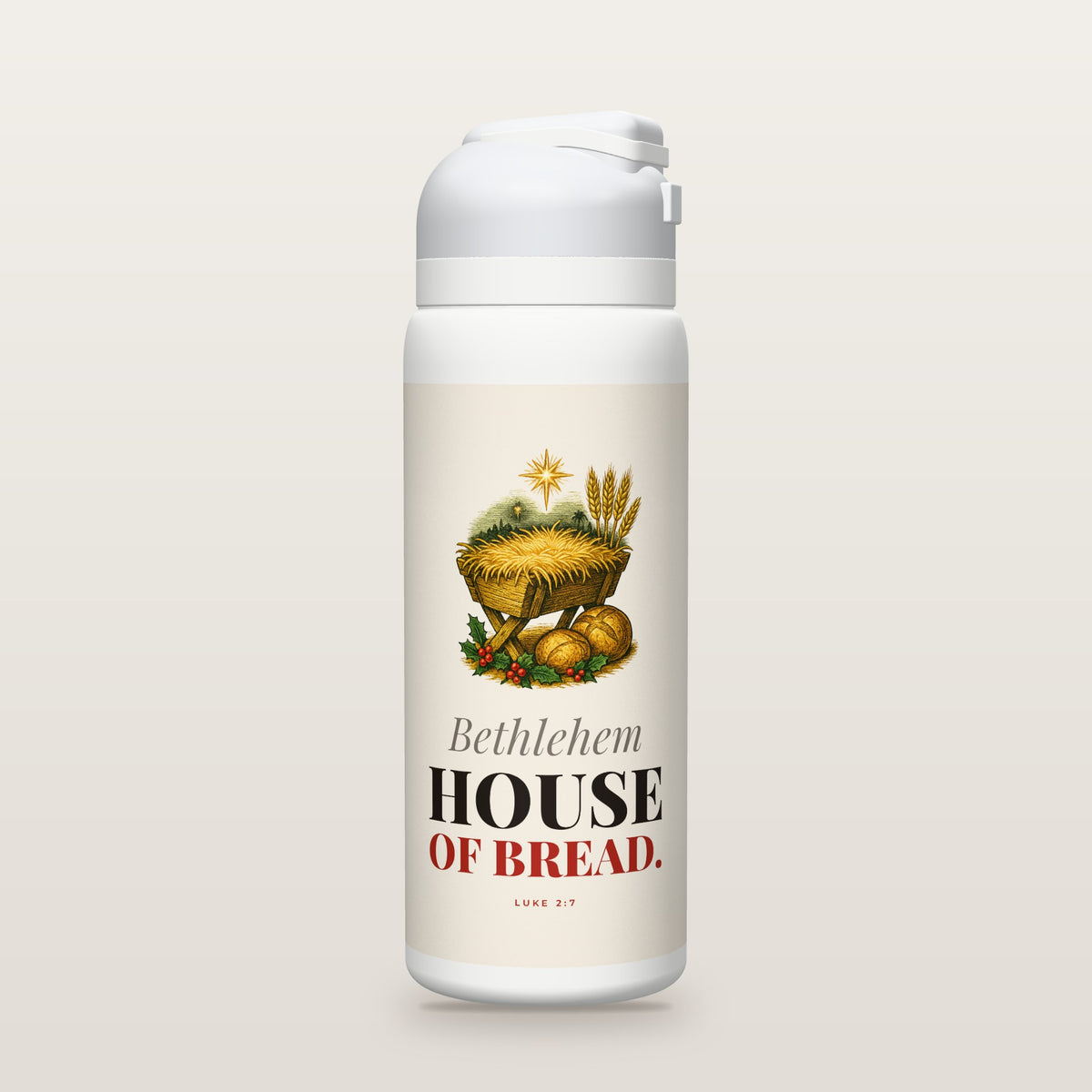 White Owala water bottle with a cream printed band, a hand-painted engraving of a manger piled with straw beside loaves of bread and wheat under a star, and the words Bethlehem HOUSE OF BREAD. with Luke 2:7.