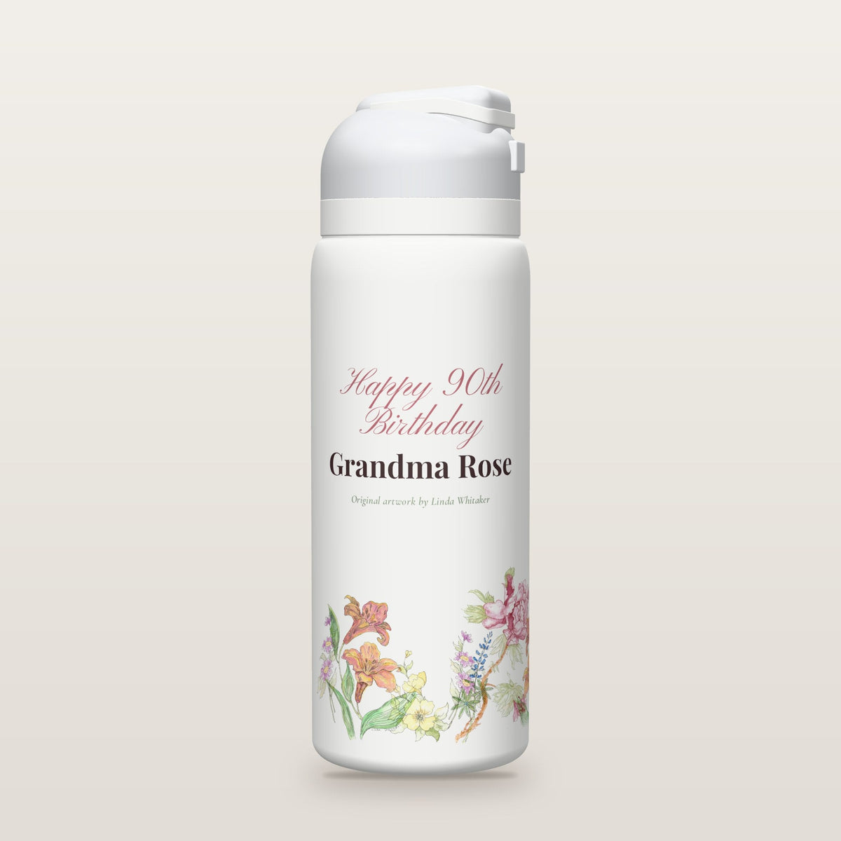 White Owala water bottle with a border of watercolor garden flowers by Linda Whitaker under Happy 90th Birthday Grandma Rose (a sample name and age).