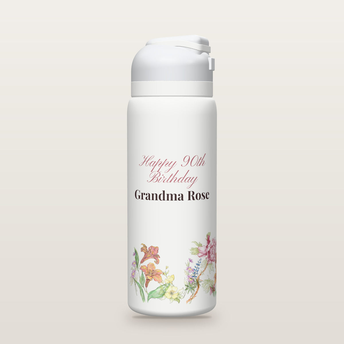 White Owala water bottle with a border of watercolor garden flowers by Linda Whitaker under Happy 90th Birthday Grandma Rose (a sample name and age).