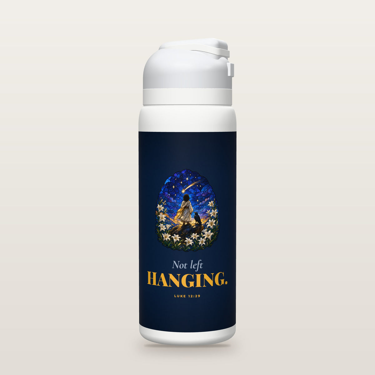 White Owala water bottle with a navy printed band, a stained-glass illustration of a robed figure standing on a rock among lilies, with a raven and a shooting star, the words Not left HANGING, and Luke 12:29 with its meaning.