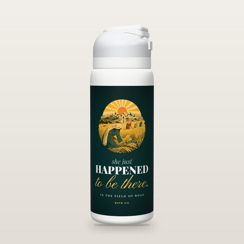 White Owala water bottle with a deep teal printed band, a vintage screen-print illustration of a young woman in a robe and head covering gathering barley at the edge of a golden field, with reapers ahead and a walled stone hill-town under a rising sun, the words she just HAPPENED to be there. in the field of Boaz, and Ruth 2:3 with the meaning of the Hebrew phrase her chance chanced.