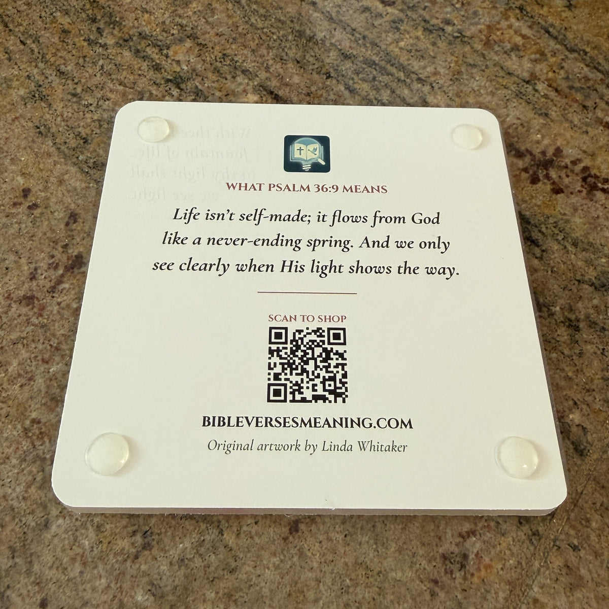 Photo of the back of the Psalm 36:9 coaster: what the verse means, QR code and clear feet