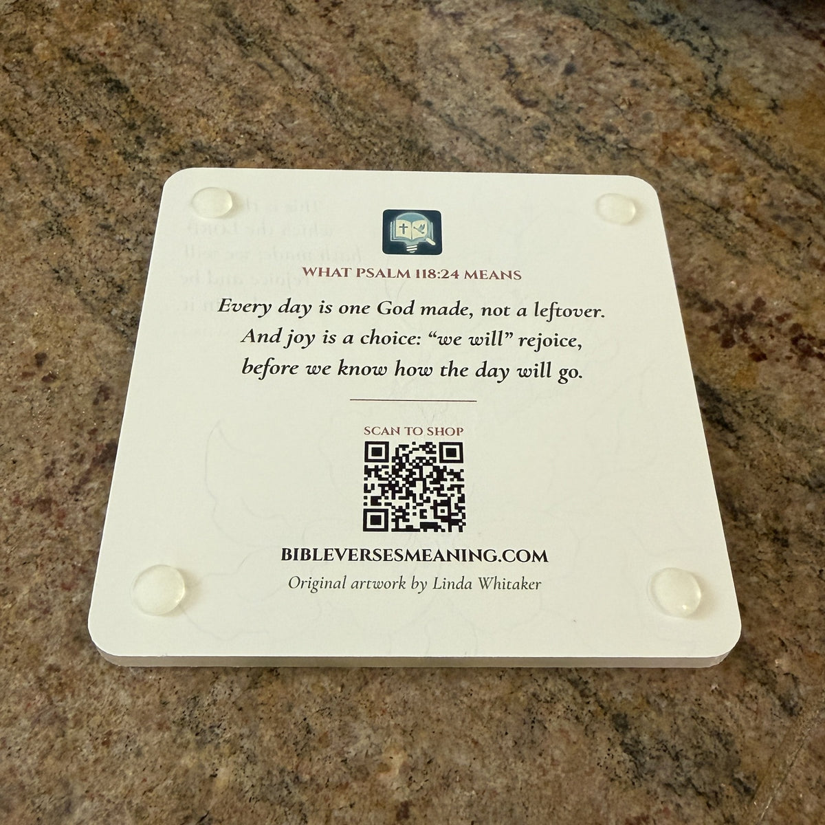 Photo of the back of the Psalm 118:24 coaster: what the verse means, QR code and clear feet